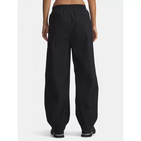  Ženske sportske hlače UNDER ARMOUR UA UNSTOPPABLE WVN PLEAT PT 6007027-001 CRNA 