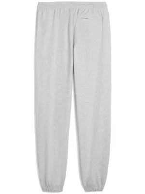 Muške trenirke PUMA M GRAPHIC FRENCH TERRY JOGGER 52770304 SVIJETLOSIVI VRIJESAK