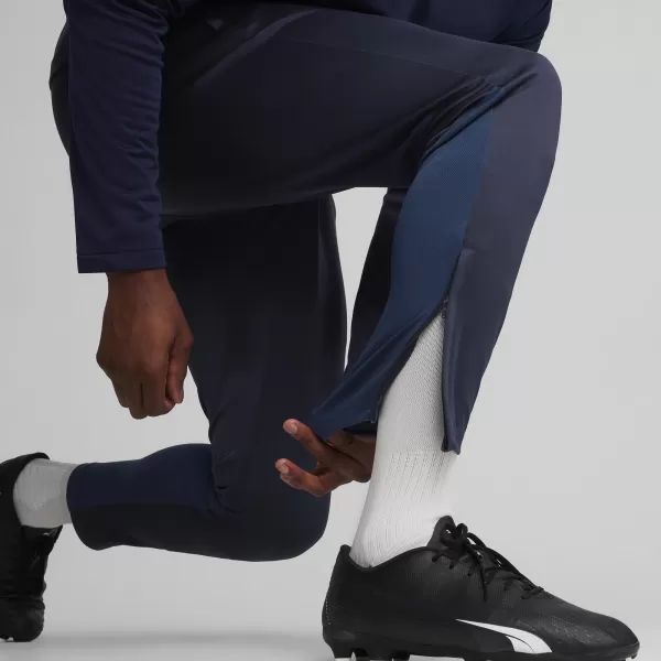  Muške hlače PUMA TEAMGOAL TRAINING PANT 658639_06 PUMA TAMNOPLAVA/BIJELA/PERZIJSKO PLAVA 