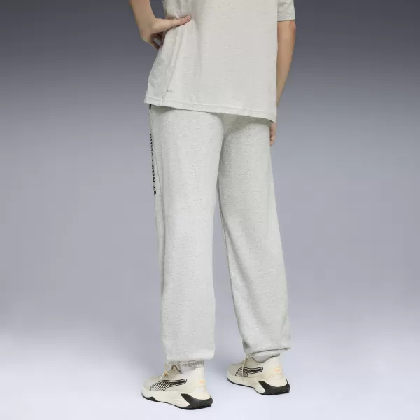  Muške trenirke PUMA M GRAPHIC FRENCH TERRY JOGGER 52770304 SVIJETLOSIVI VRIJESAK 
