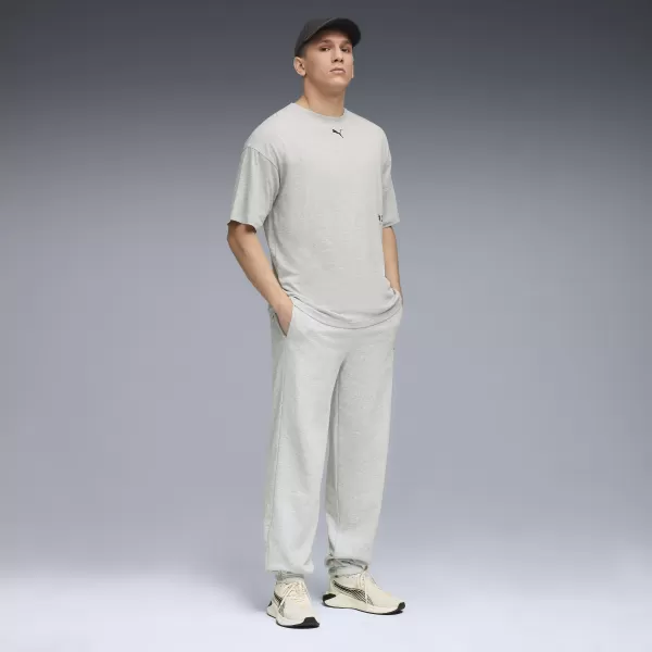  Muške trenirke PUMA M GRAPHIC FRENCH TERRY JOGGER 52770304 SVIJETLOSIVI VRIJESAK 