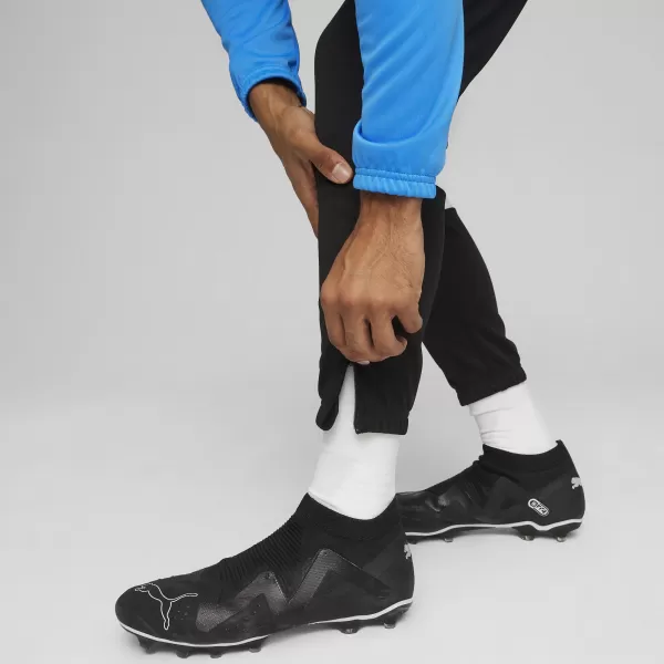 Komplet muške trenirke PUMA TEAMRISE TRACKSUIT 658653_02 IGNITE BLUE/ ZAPALITI PLAVO/PUMA CRNO 