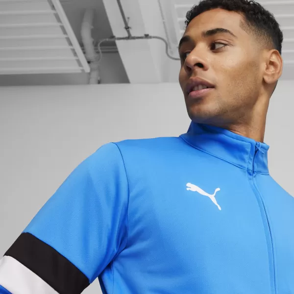  Komplet muške trenirke PUMA TEAMRISE TRACKSUIT 658653_02 IGNITE BLUE/ ZAPALITI PLAVO/PUMA CRNO 