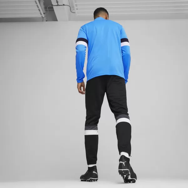  Komplet muške trenirke PUMA TEAMRISE TRACKSUIT 658653_02 IGNITE BLUE/ ZAPALITI PLAVO/PUMA CRNO 