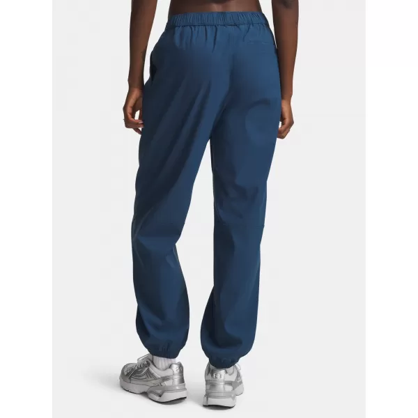  Ženske trenirke UNDER ARMOUR UNSTOPPABLE WVN JOGGER 6011400-498 PLAVA 