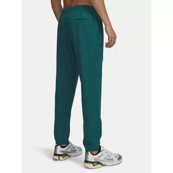  Muške trenirke UNDER ARMOUR VIBE WOVEN JOGGER 1386557-338 ZELENA 