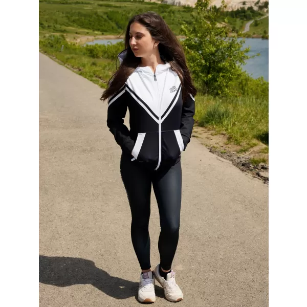  Ženska premium funkcionalna majica s patentnim zatvaračem ALTISPORT VOJ/ALW101MI02 CRNO-BIJELO 