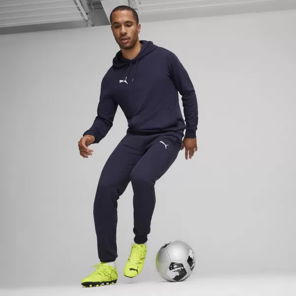  Hlače PUMA TEAMGOAL CASUALS PANTS 658598_06 PUMA MORNARICA/PUMA BIJELA 
