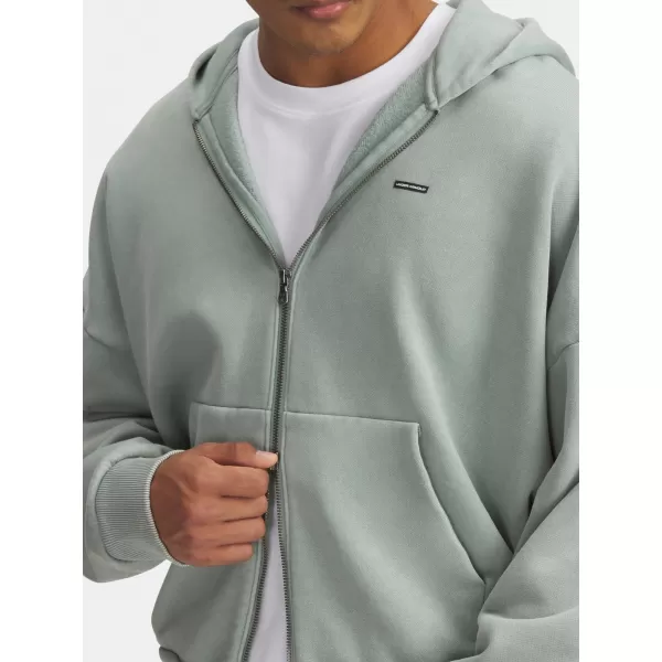  Muški sweatshirt UNDER ARMOUR ICON HWT FLEECE WASH FZ 6000651-348 ZELENA 