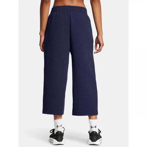  Ženske sportske hlače UNDER ARMOUR UNSTOPPABLE FLC GRID CROP 1386492-410 PLAVA 