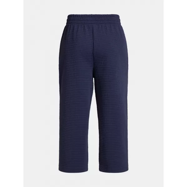  Ženske sportske hlače UNDER ARMOUR UNSTOPPABLE FLC GRID CROP 1386492-410 PLAVA 