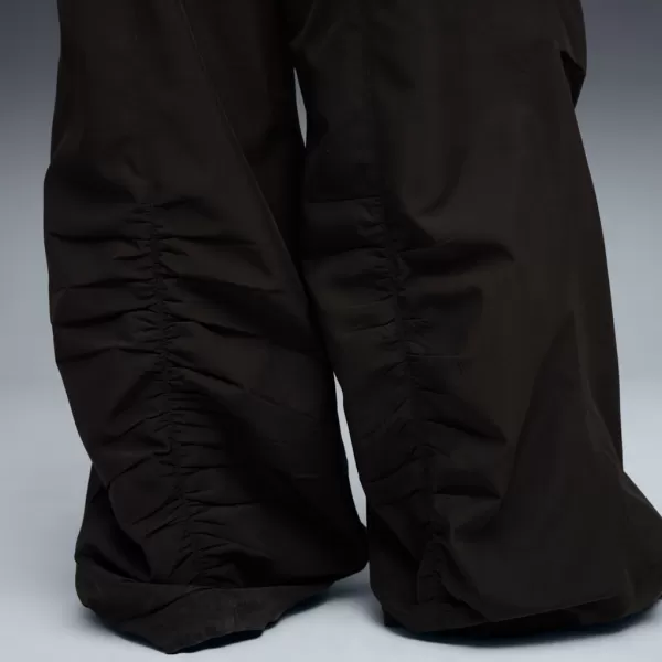  Ladijske hlače PUMA WARDROBE ESS PARACHUTE WOVEN PANTS OP 632044-01 CRNI 