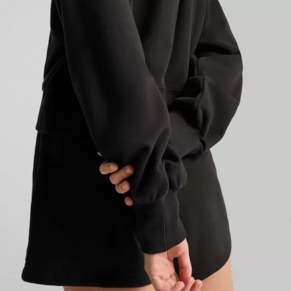  Ženska majica PUMA WARDROBE ESS RELAXED CROPPED HOODIE TR 629746-01 CRNI 